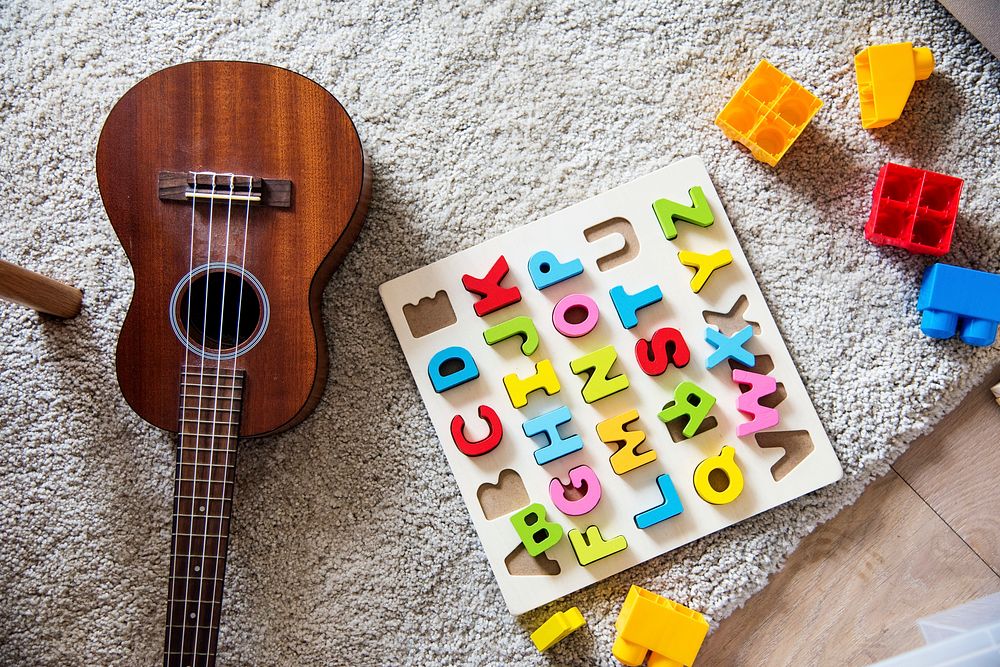 Guitar and educational toys in living room