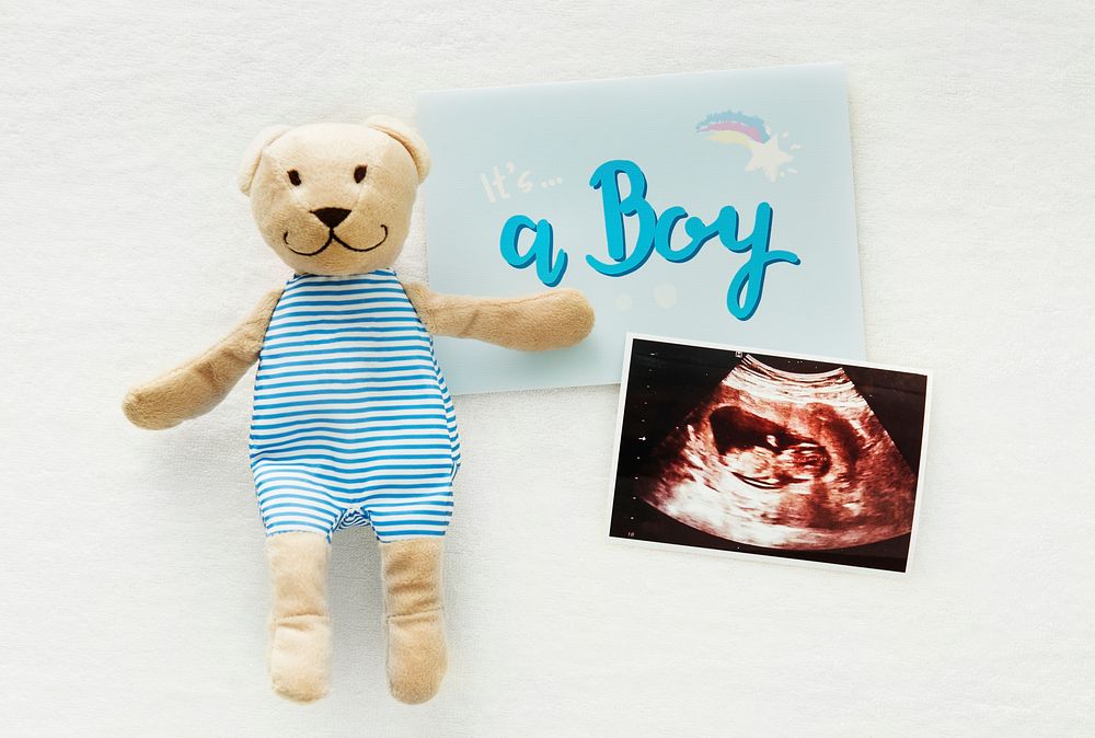 Pregnancy announcement gender reveal, it's a boy