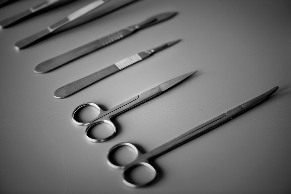 Closeup of surgery knives set isolated