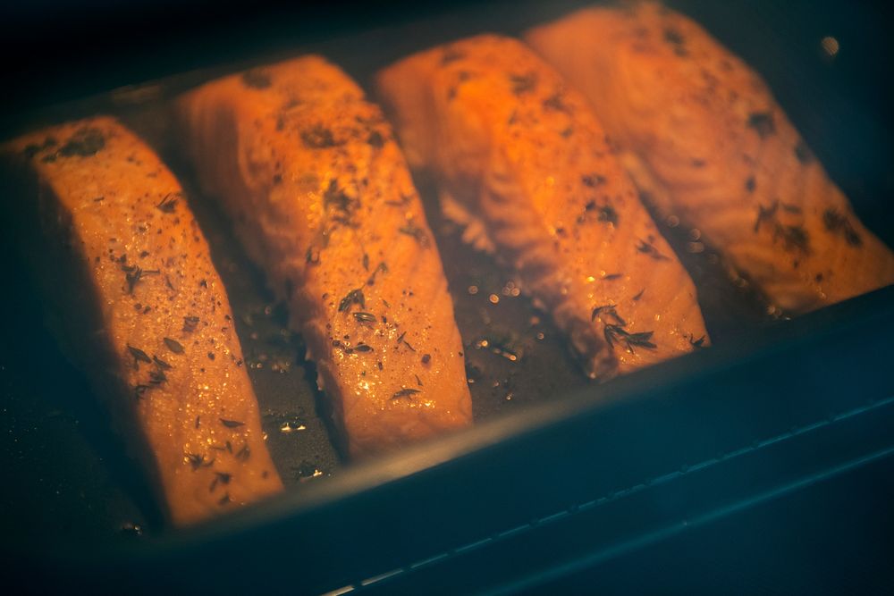 Raw salmon preparing to be cooked