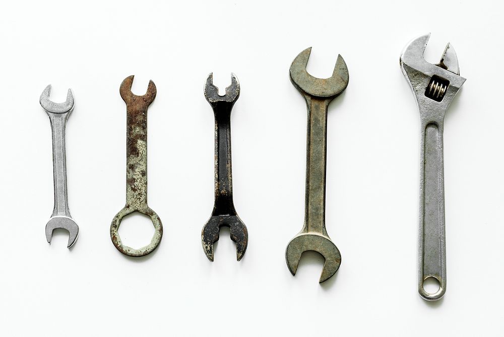 Flat lay of various wrench isolated on white background