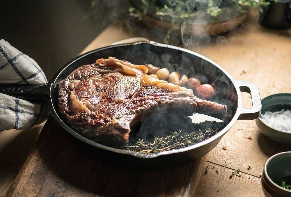 Cooking lamb steak in a pan food photography recipe idea