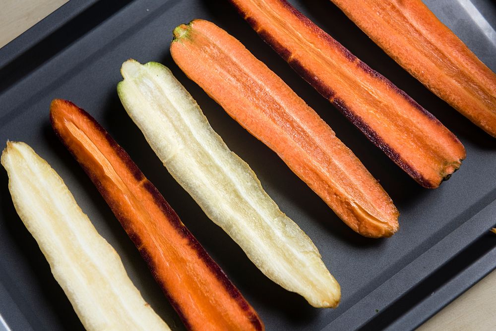 Roasted carrots and turnips on a tray