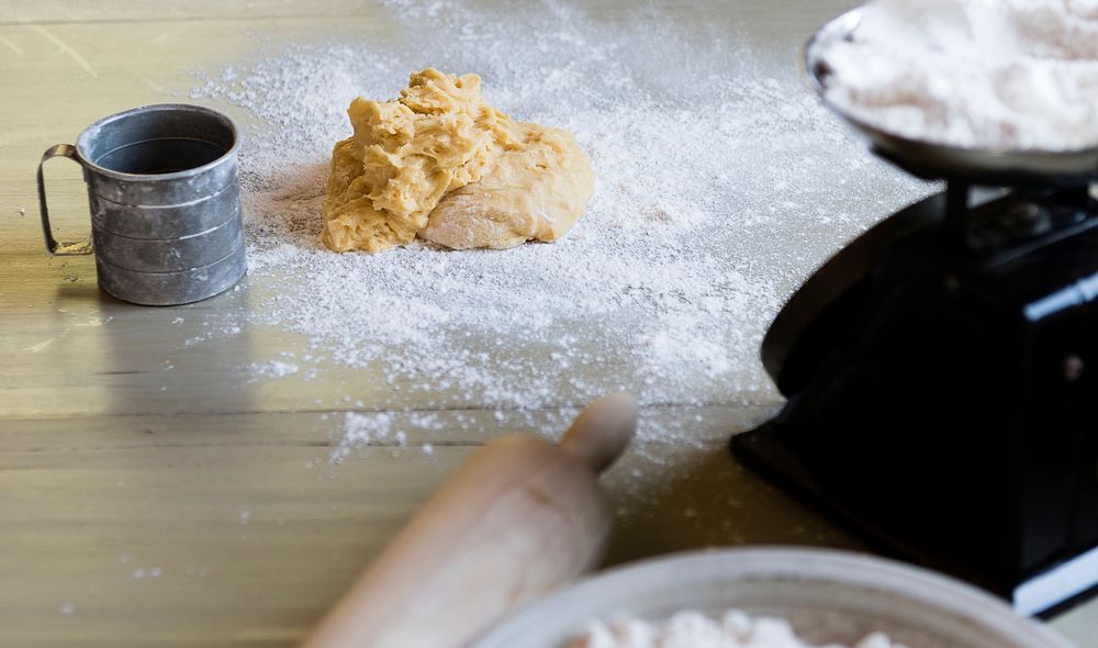 Dough on a table with a weighing | Premium Photo - rawpixel