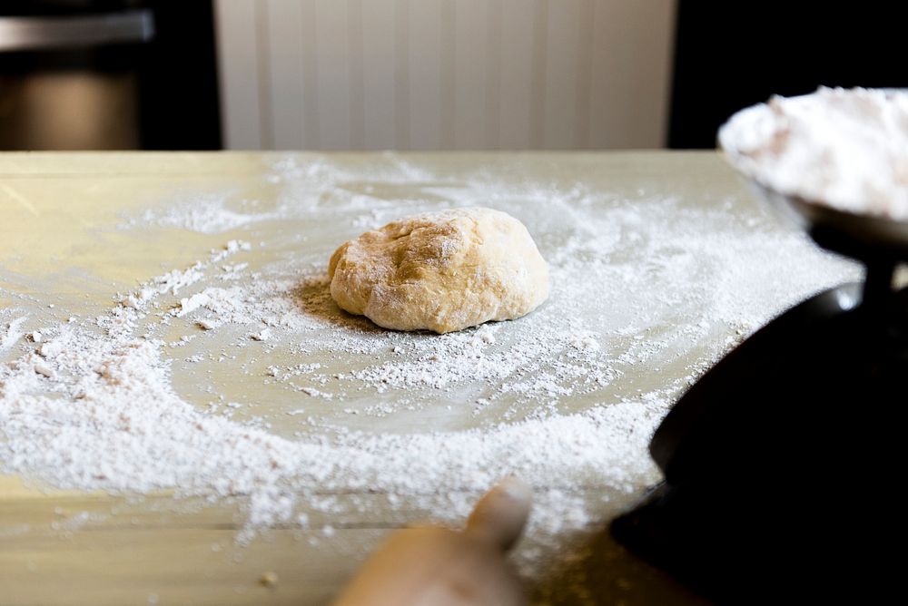 Dough on a table with flour