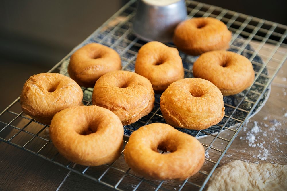 Fried donuts on a cooling rack