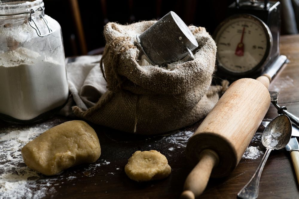 Baking ingredients and tools on a wooden table