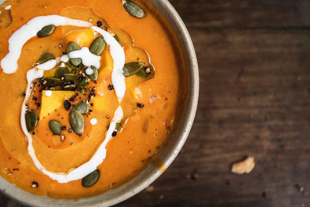 Close up of a pumpkin soup in a bowl