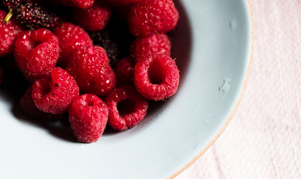 Close up of rasberries in a bowl