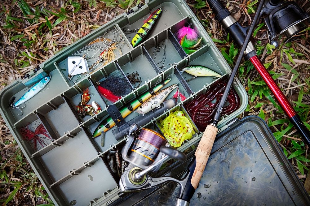 Tackle Box with Flies and Fly Fishing Rod Stock Photo - Image of