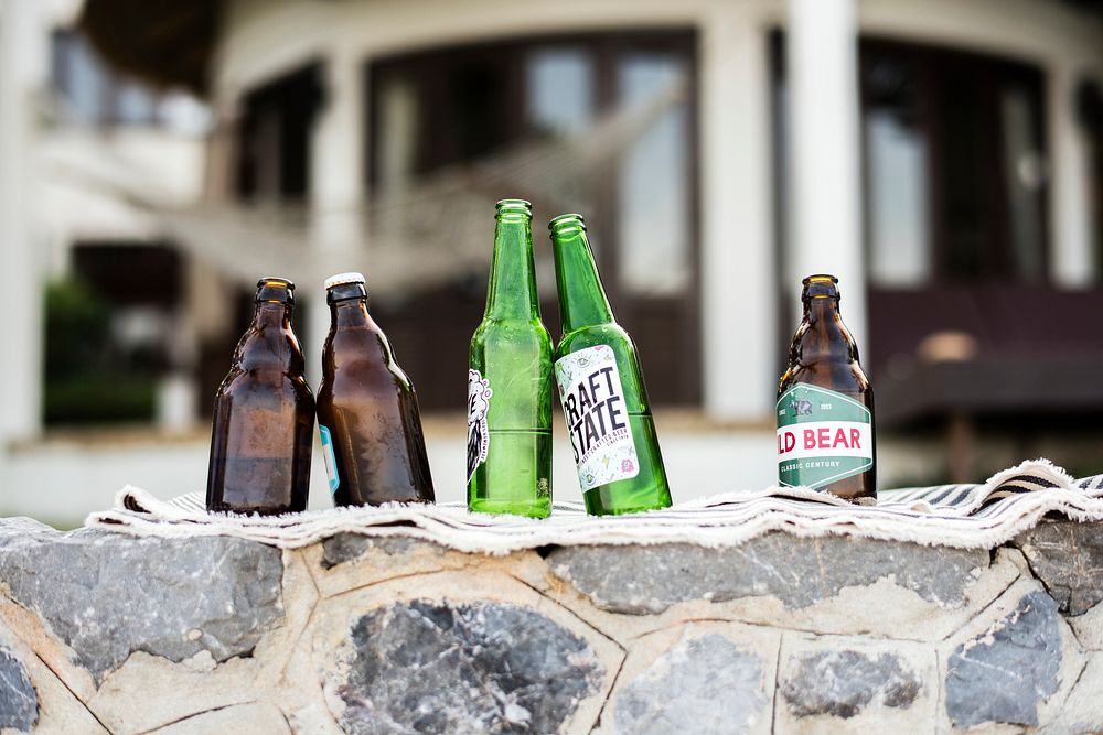 Beer bottles in front of a house