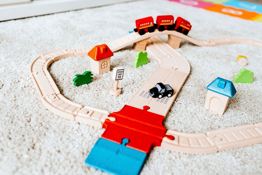 Wooden railroad train toy in a nursery