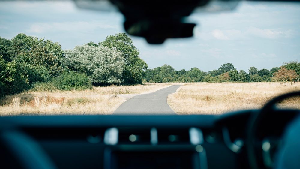 Adventure desktop wallpaper background, countryside view through car windscreen