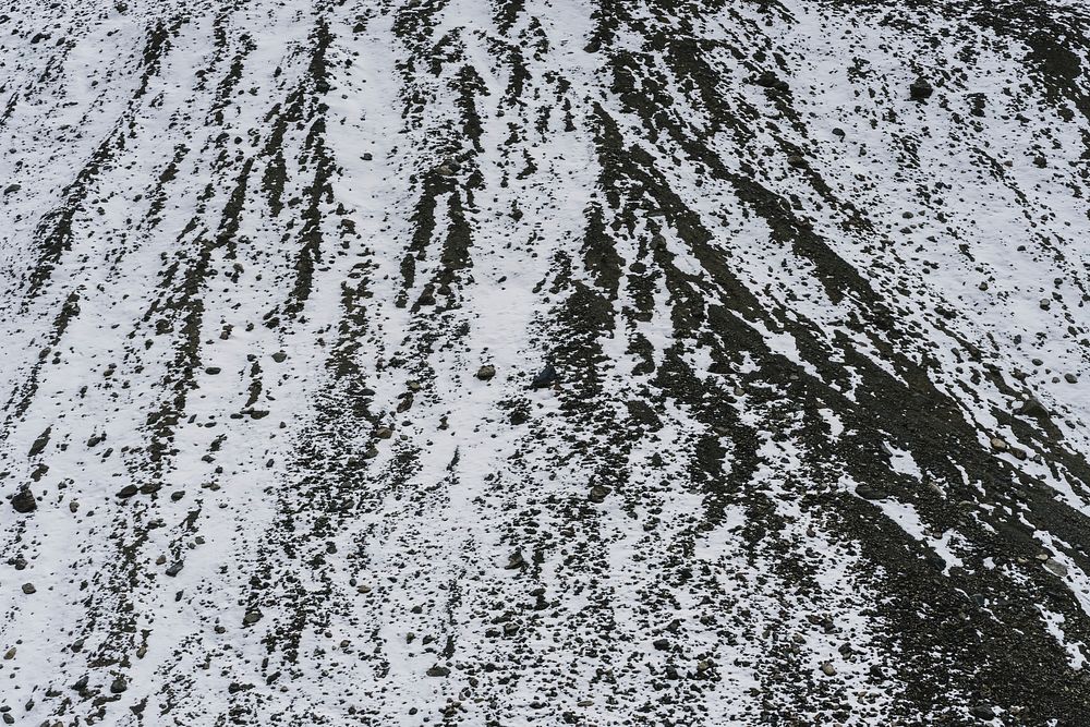 Close up of a mountain covered in snow