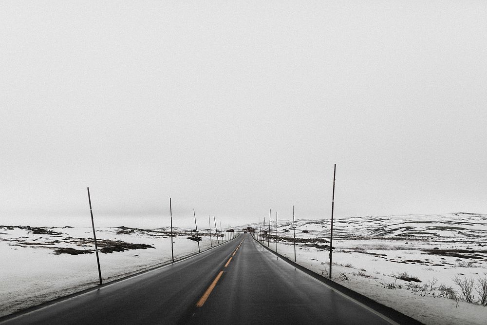 View of a wet road in the winter