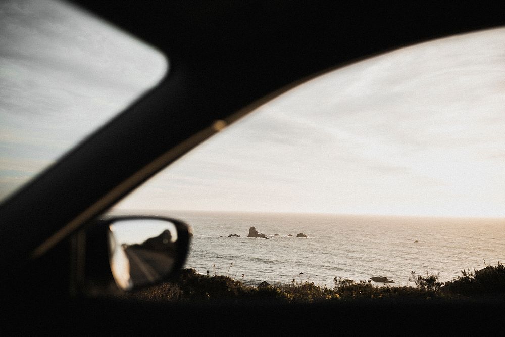 Car passing the Big Sur coast in California, USA