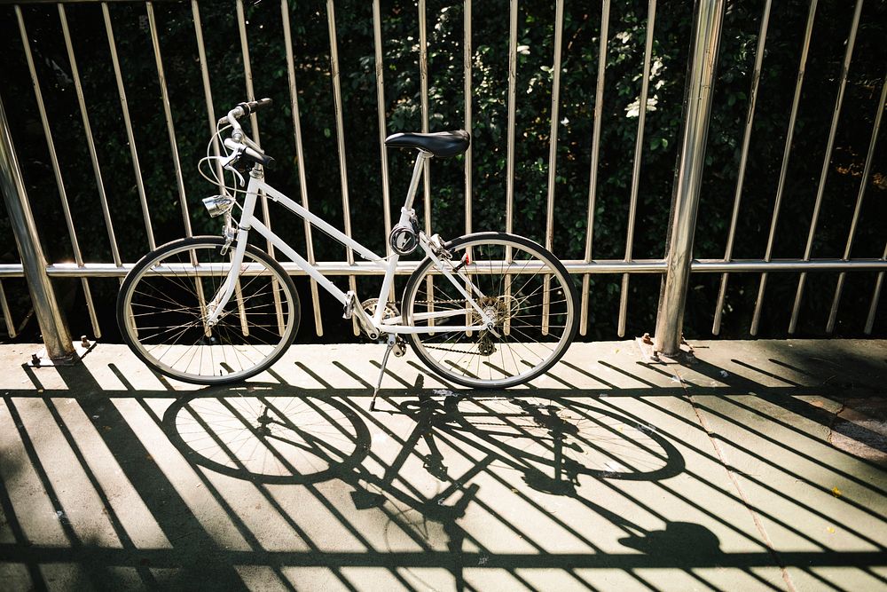 White bike parking on a street side