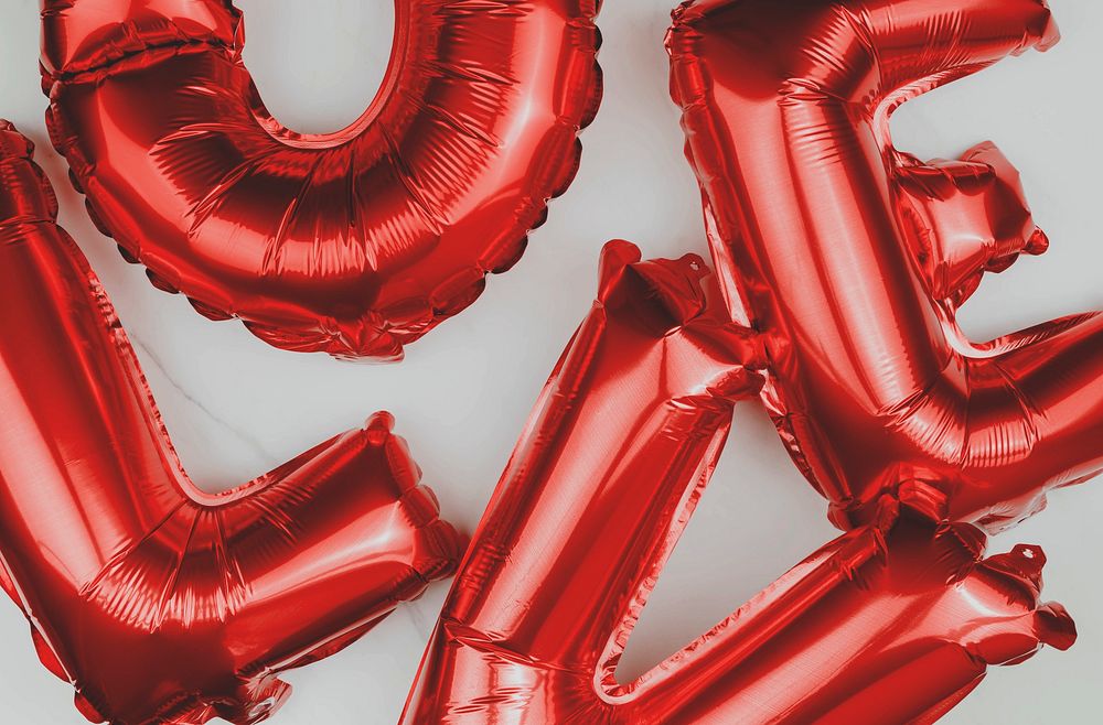 Red love blown up balloons
