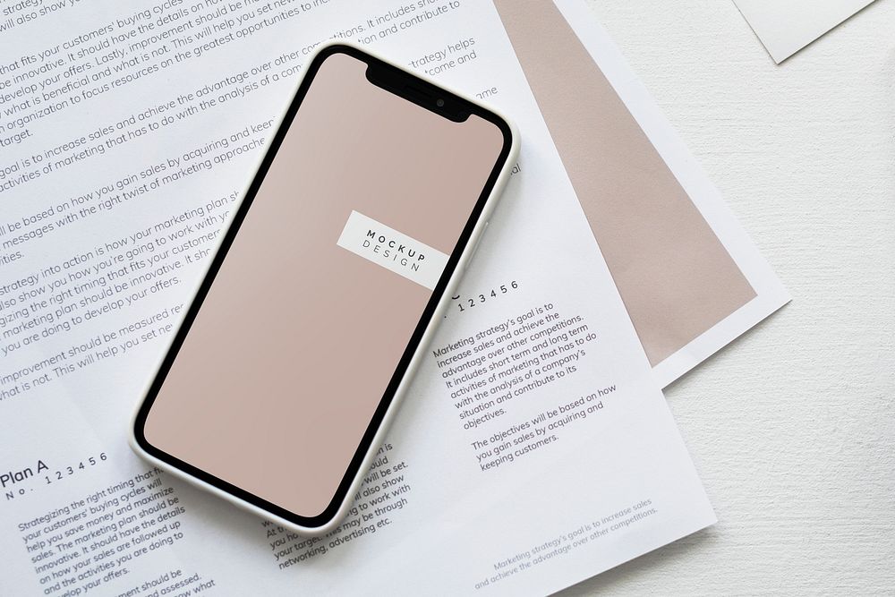 Mobile phone mockup on a paper