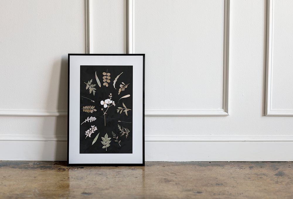 Floral frame against a white wall