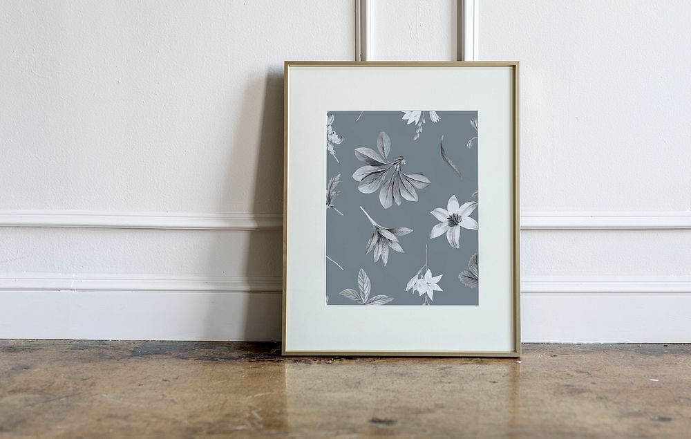 Floral frame against a white wall