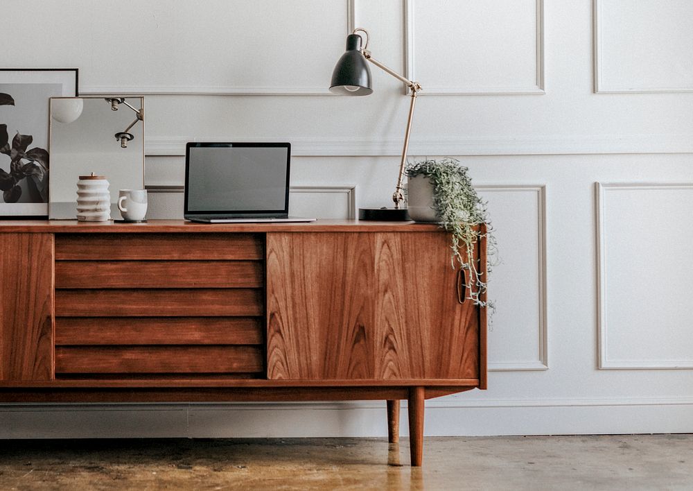 Wooden cabinet against a white wall