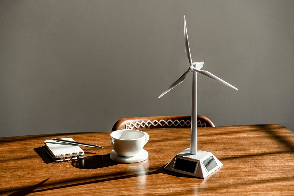 Solar wind turbine model on a wooden table