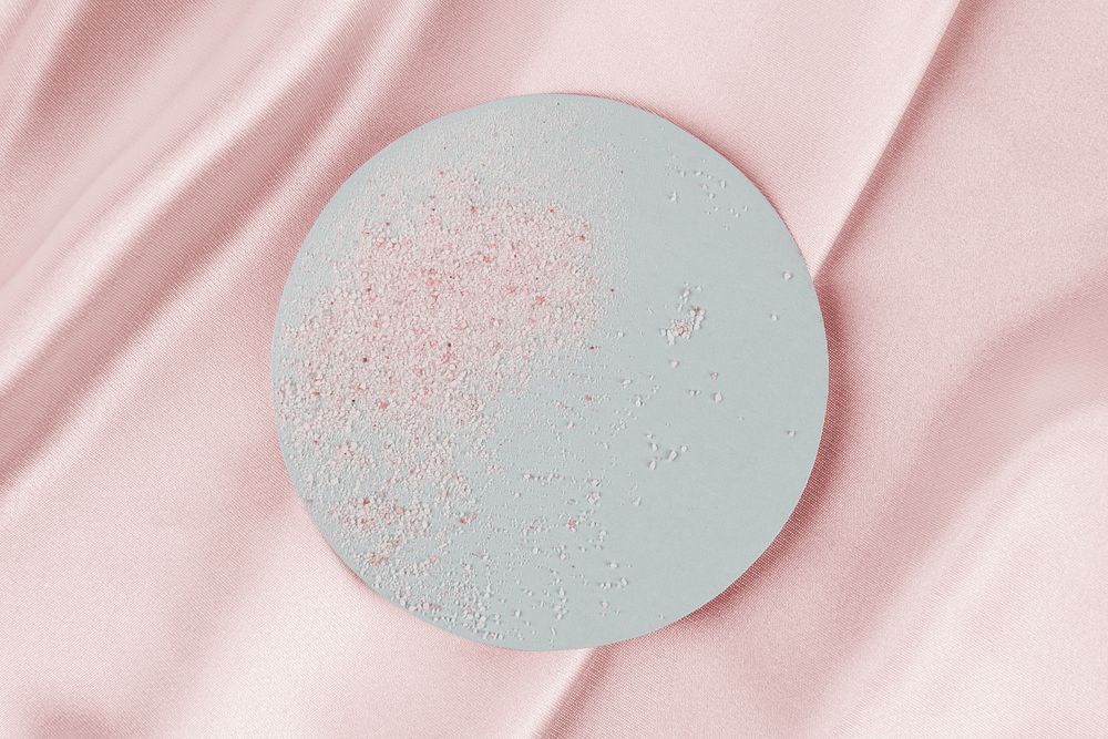 Pink sand texture on a gray paper design resource 