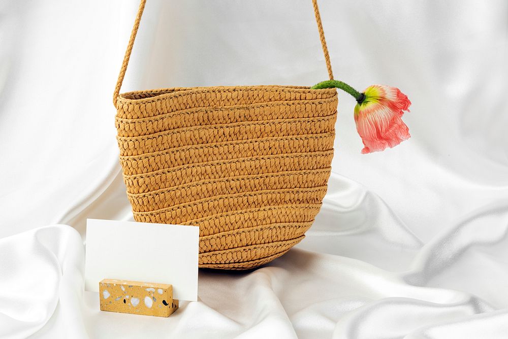 Straw woven bag with a name card mockup 