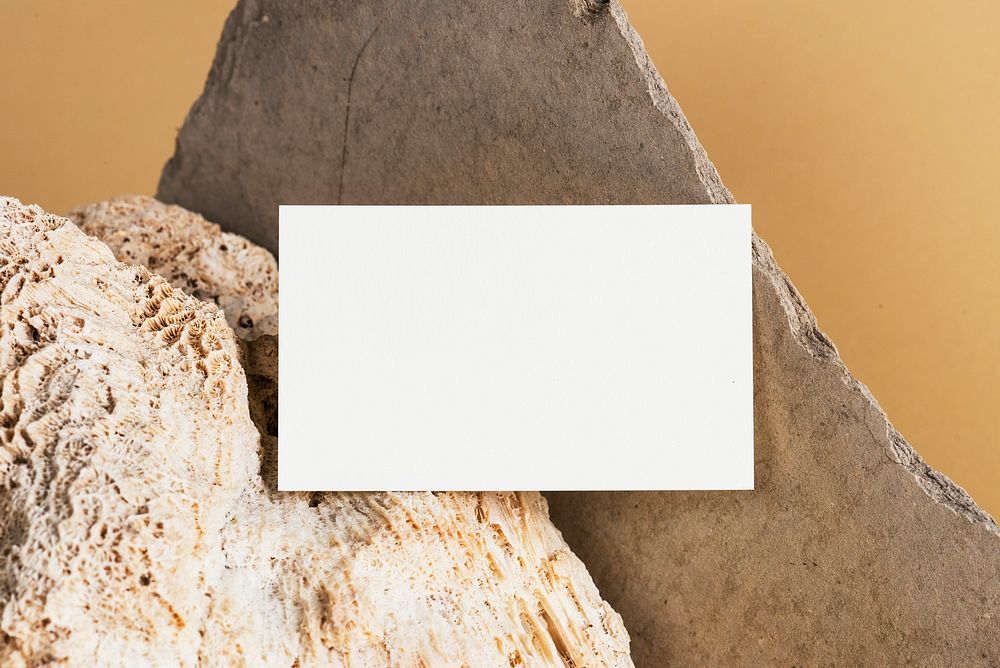 White name card on a stone