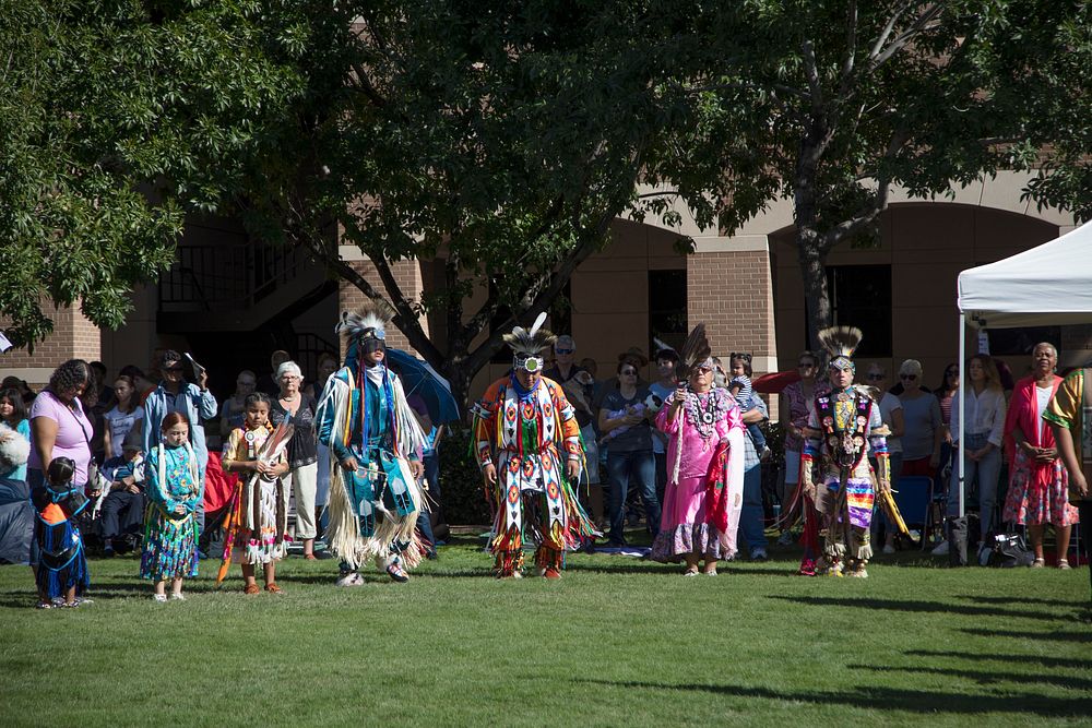 Dancers arrive at the annual Veterans Day Weekend Traditional Pow Wow, held on the Fletcher Library Lawn at Arizona State…