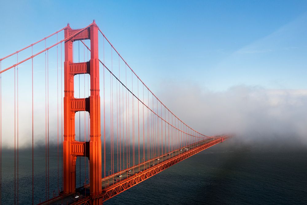 Fog rolls across the Golden Gate Bridge in San Francisco, California. Original image from Carol M. Highsmith&rsquo;s…