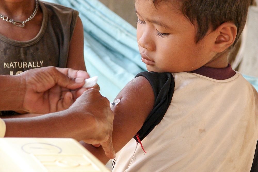 A Cambodian boy receiving his injection of measles vaccine. Original image sourced from US Government department: Public…