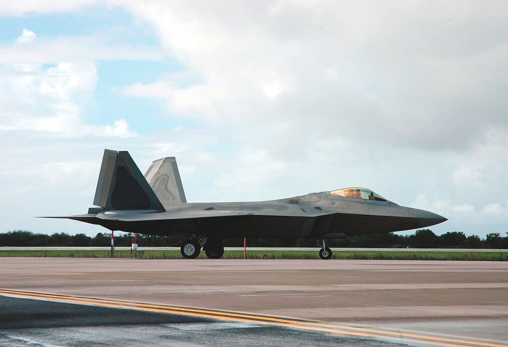 U.S. Air Force F-22 Raptor arrives at the Shuttle Landing Facility at NASA's Kennedy Space Center during the World Space…