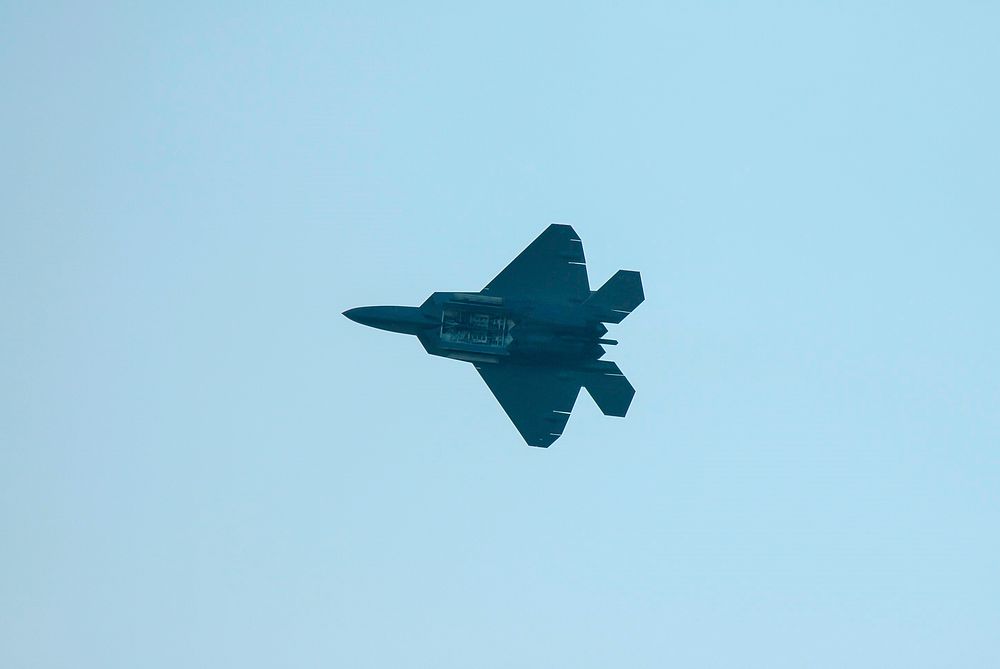 U.S. Air Force F-22 Raptor flies overhead as part of the World Space Expo aerial salute at NASA's Kennedy Space Center.…