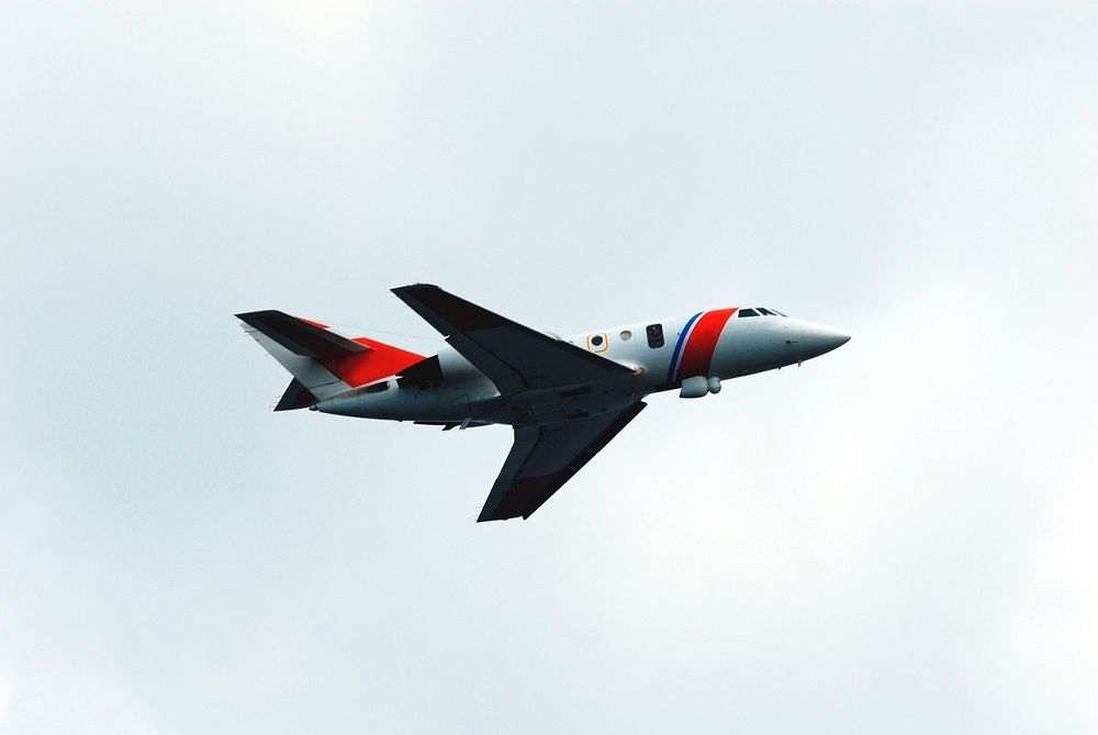 U.S. Coast Guard HU-25 Falcon jet flies overhead during a rescue training exercise, known as Mode VIII, off Florida's…