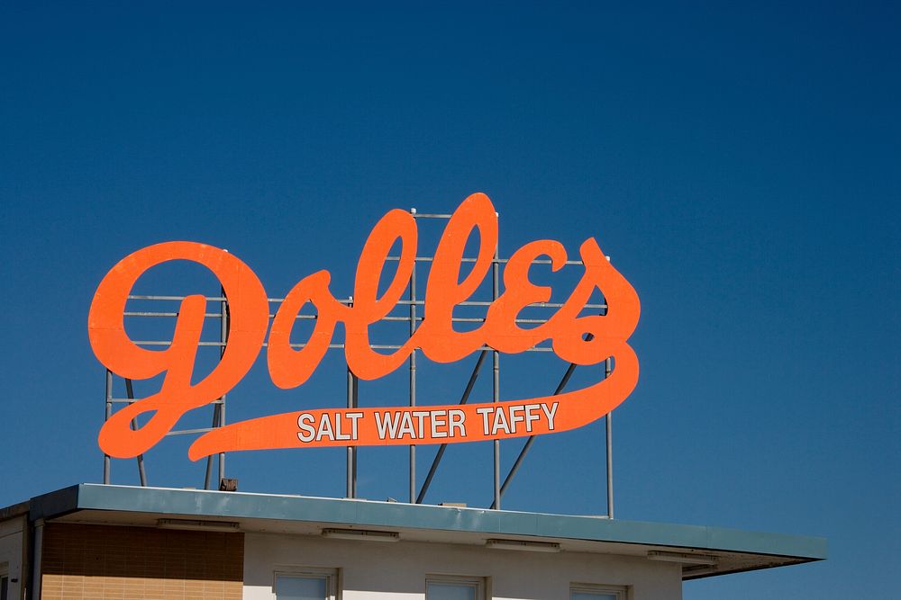 Dolles Salt Water Taffy sign, Rehoboth Beach, Delaware (2006) by Carol M. Highsmith. Original image from Library of…