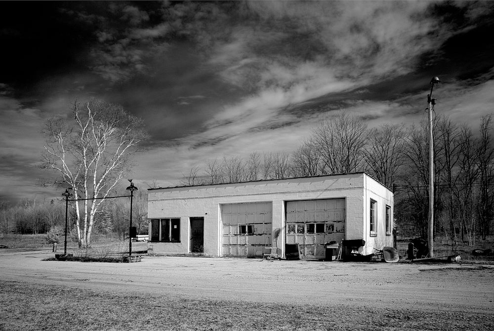 Old gas station along the road in rural upperstate Michigan (2008) by Carol M. Highsmith. Original image from Library of…