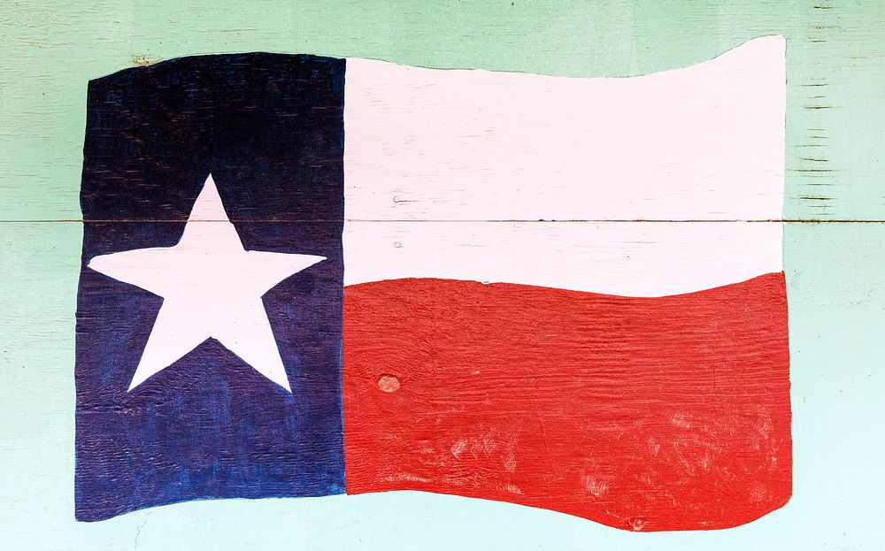 The flag of Texas, depicted on a downtown wall in Pecos, the seat of Reeves County, Texas. Original image from Carol M.…