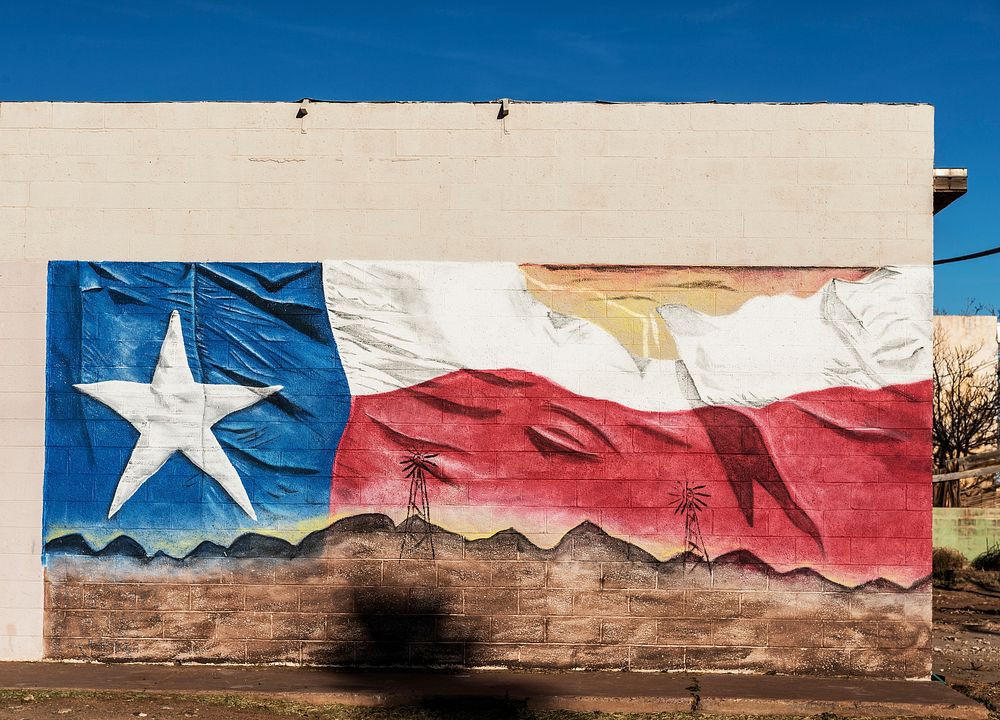 Now-incomplete depiction of a Texas flag on a building in Van Horn, Texas. Original image from Carol M. Highsmith&rsquo;s…