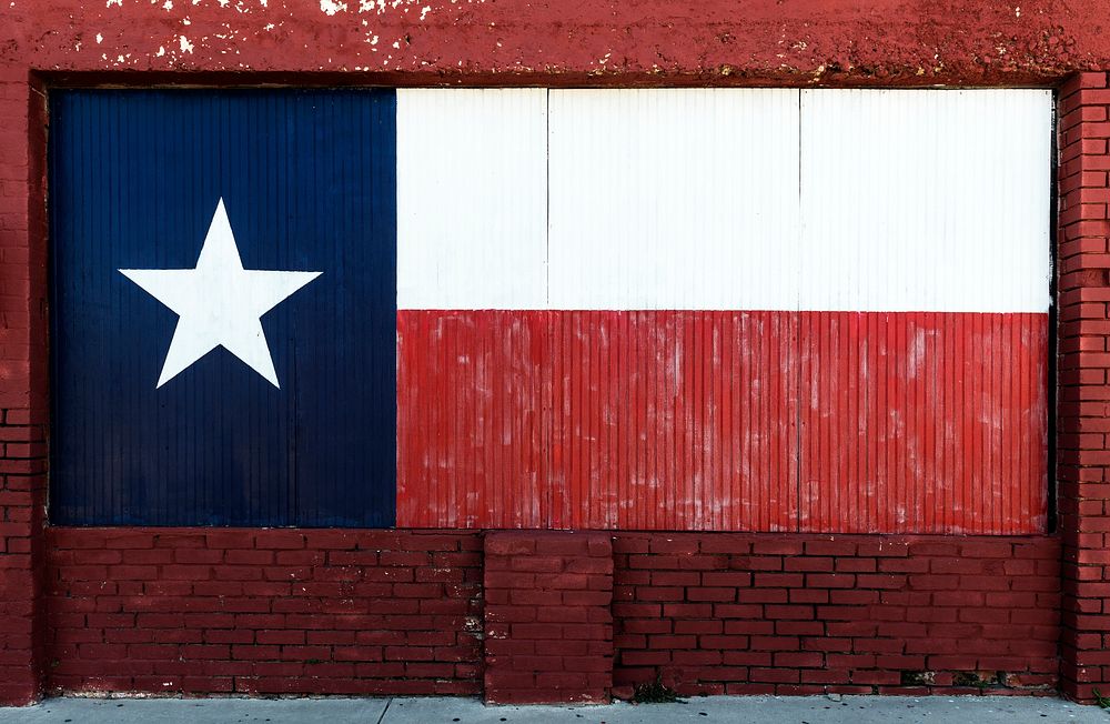 Texas flag, painted on boarded-up window in Brownwood, the seat of Brown County in Central Texas. Original image from Carol…