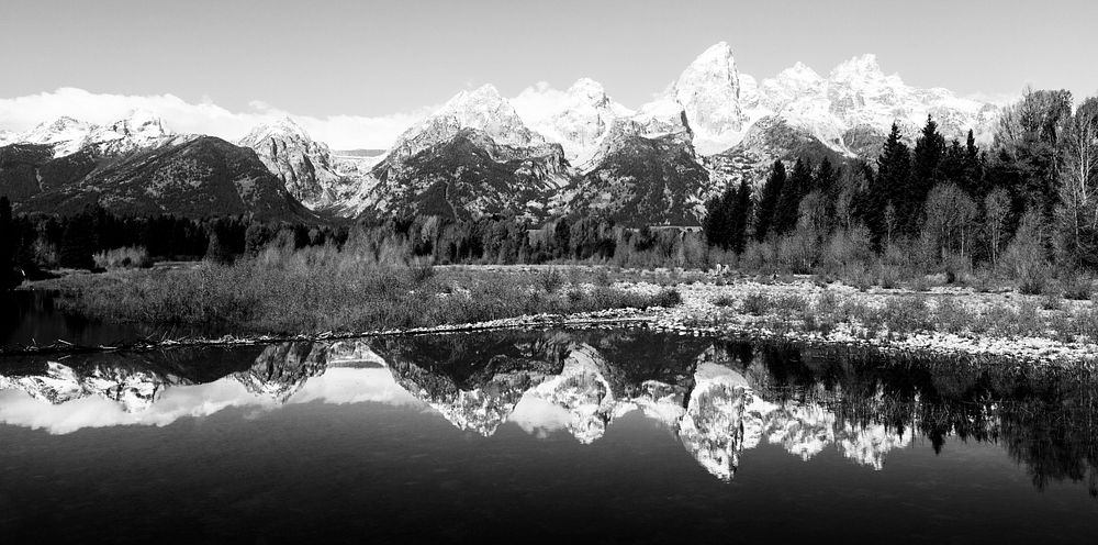 The majestic peaks of the Teton Range reflect in a mountain stream in Grand Teton National Park in northwestern Wyoming.…