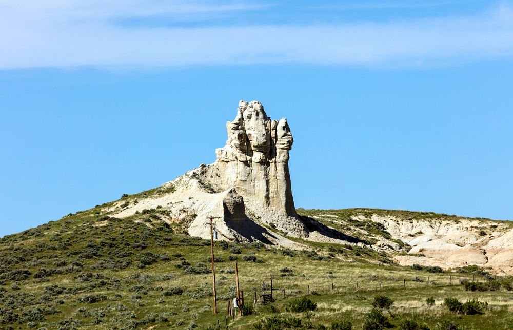 Teapot Rock, a distinctive sedimentary rock formation in Natrona County, Wyoming. Original image from Carol M.…
