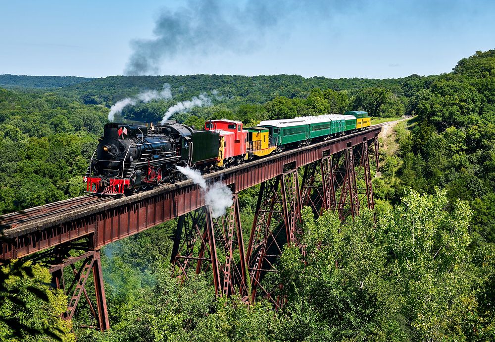A steam train crosses the 156-foot-tall Bass Point Creek Bridge. Original image from Carol M. Highsmith&rsquo;s America…