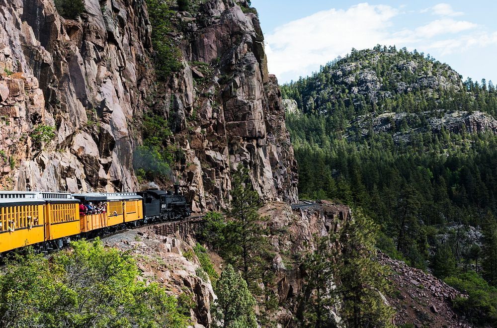 A Durango & Silverton Narrow Gauge Railroad (D&SNG) above the Animas River Valley in La Plata County, Colorado USA -…
