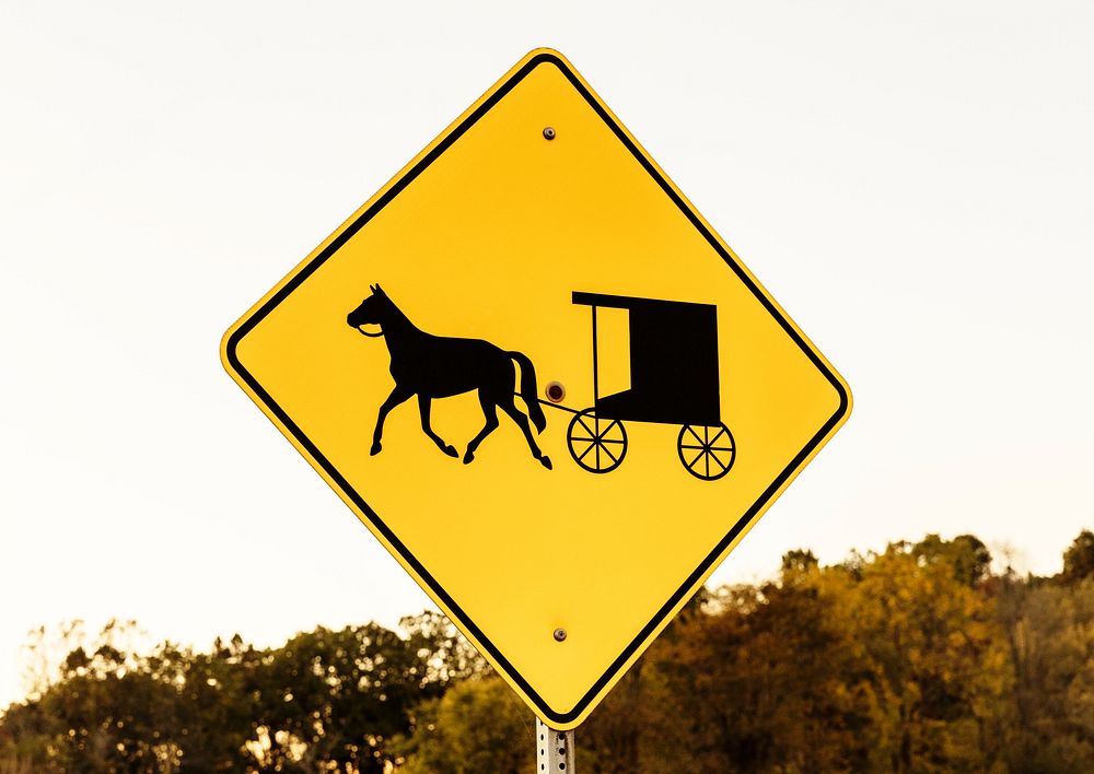 A "buggy warning" site is a familiar sight in Morrow County, Ohio, near Chesterville. Original image from Carol M.…