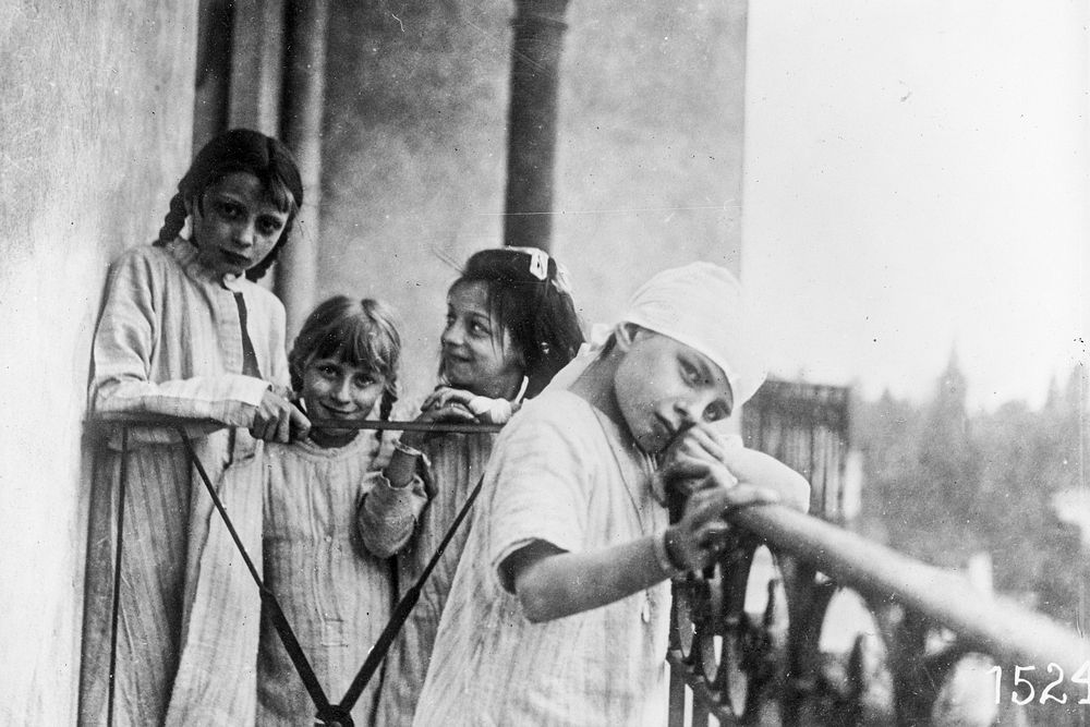 On the balcony at Evian ARC hospital. Anaemic children from Paris dispensary (1918). Original from Library of Congress.…