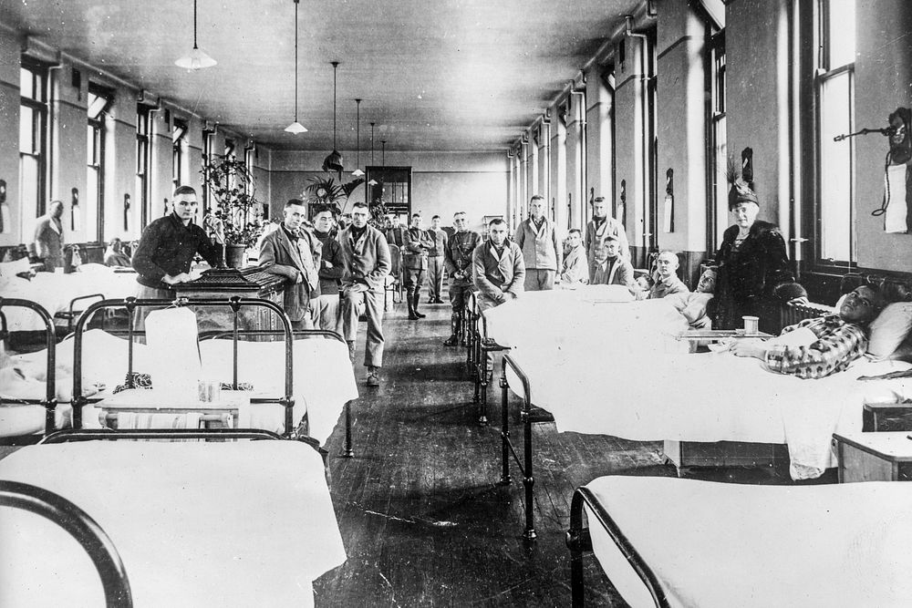 American ward at the Fourth Scottish General Hospital in Glasgow. Most of the patients are influenza cases from incoming…