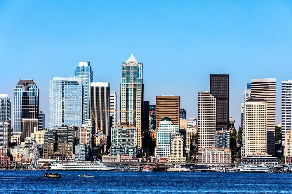 View of the Seattle, Washington, skyline from the the city's Alki neighborhood across Elliott Bay. Original image from Carol…