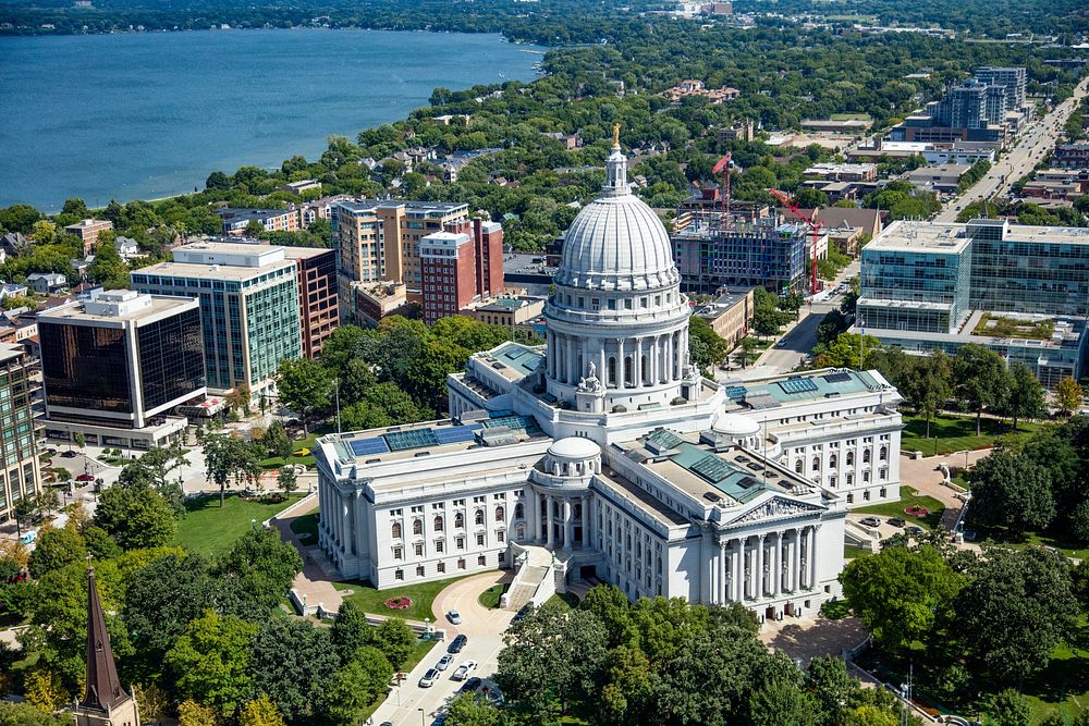 Aerial view of the Wisconsin Capitol and surrounding neighborhoods in Madison, Wisconsin Original image from Carol M.…